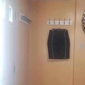 A body fit above the knee skirt